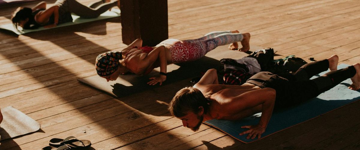 People of different ages doing yoga together